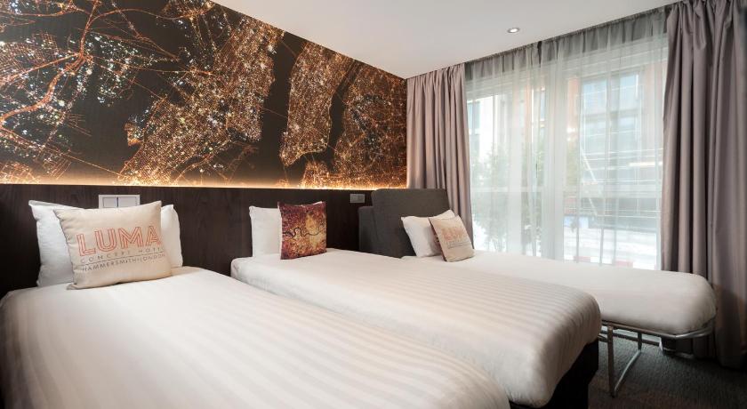 Image of Deluxe Triple Room 0