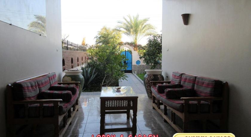 a living room filled with furniture and a walkway, Sunny Luxor in Luxor