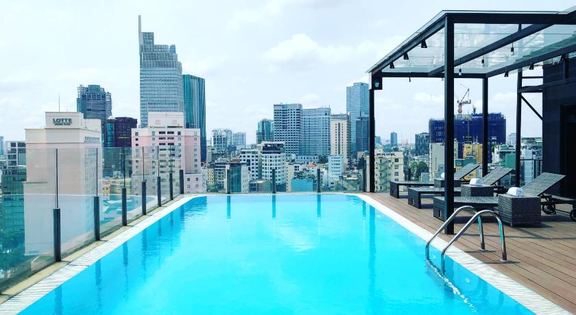 a large swimming pool in a large city, Bay Hotel Ho Chi Minh in Ho Chi Minh City