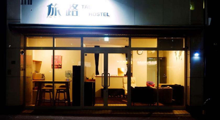 a store front with a door open to the outside, Fukuoka Tabiji Hostel & Guesthouse in Fukuoka