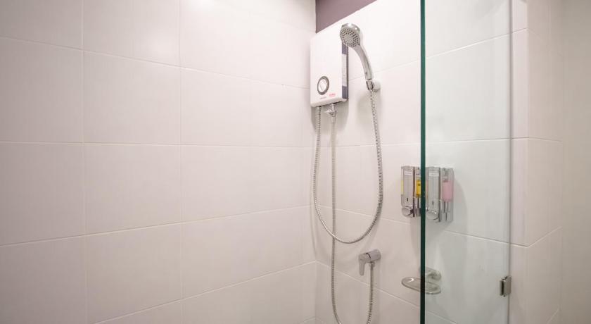 a bathroom with a shower stall and a shower curtain, Fortune D Loei Hotel (SHA Certified) in Loei