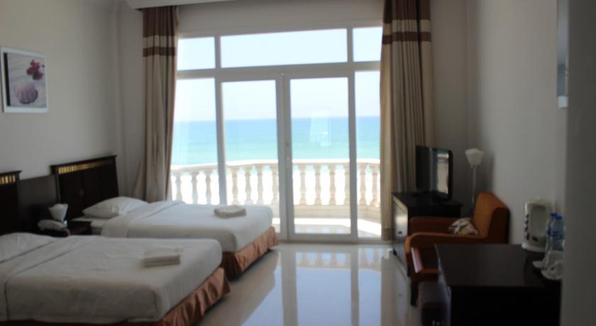 Image of Deluxe King Room with Sea View and ‎Balcony 12