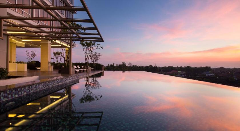 a large body of water with a view of a city, Grand Mercure Solo Baru in Surakarta