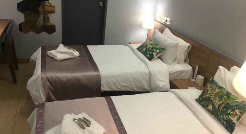 Immagine di Standard Doppia con Letti Separati Senza Finestre (Standard Twin Bed Without Window) 7