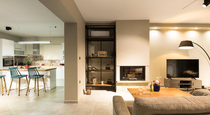 Evangelie Residence a brand new design apartment 5 minutes from the sea with a large garden — Hotel in Crete Island