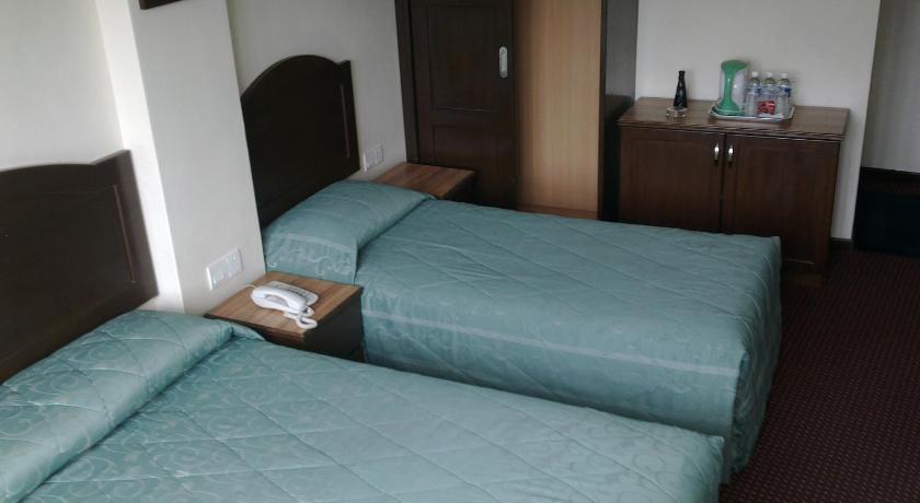 Image of Deluxe Triple Room 0