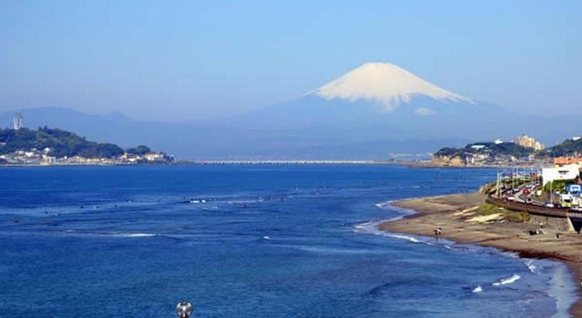 a large body of water surrounded by mountains, Hotel Wing International Shonan-Fujisawa in Kamakura