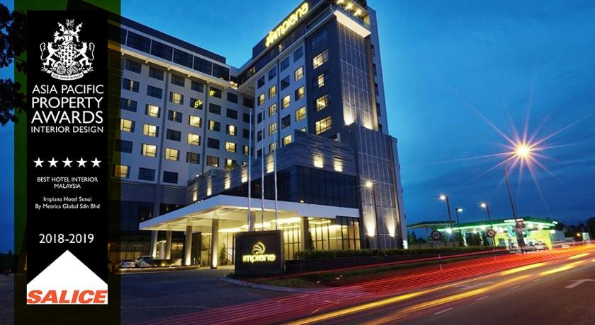 a large building with a clock on the side of it, Impiana Hotel Senai in Johor Bahru