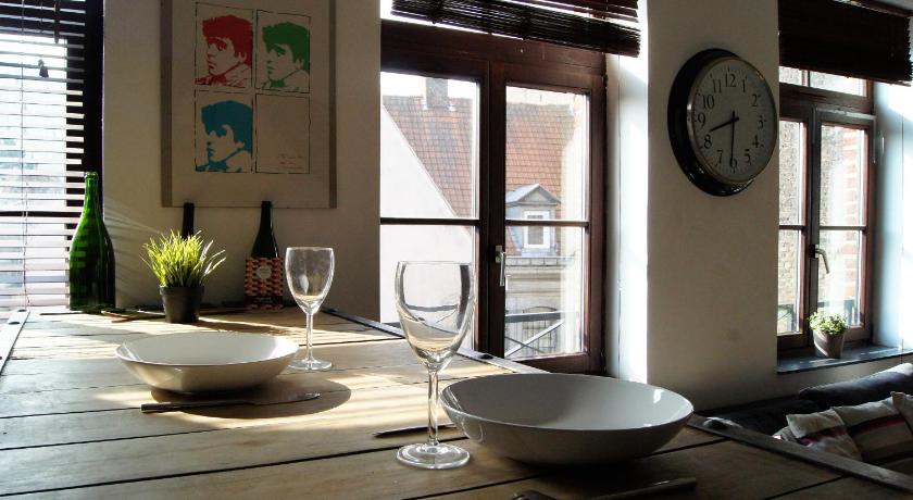 a white table topped with a bowl of food next to a window, Little Suite - Louise in Lille