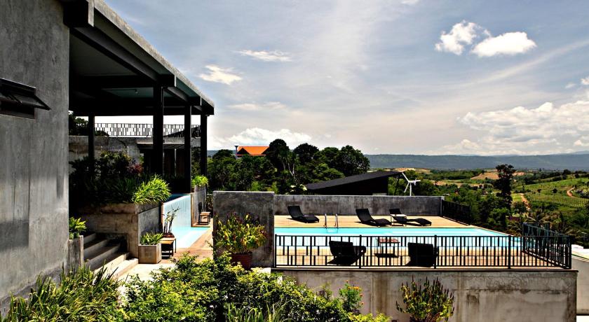 an outdoor patio with a view of the city, Veravian Resort in Khao Yai