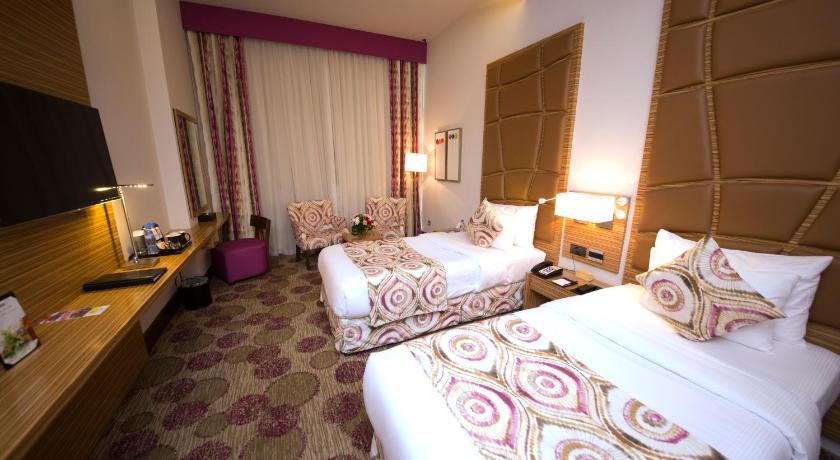 Image of 3 Single Beds, Nonsmoking, Deluxe Room 1