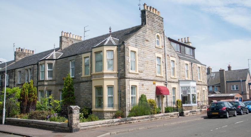 a large building with a large window on the side of it, Lomond Guest House in Leven (Fife)