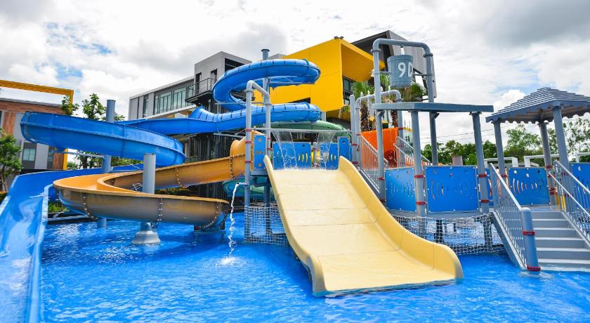 a swimming pool filled with lots of blue and yellow surfboards, 9D Sport Hotel (SHA Extra Plus) in Udon Thani