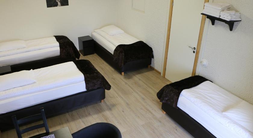 Image of Quadruple Room with Shared Bathroom 0