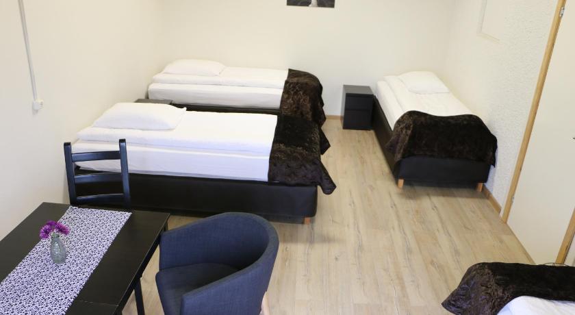 Image of Quadruple Room with Shared Bathroom 1