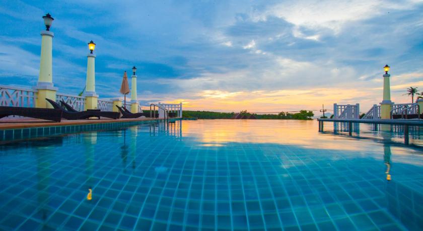 a large swimming pool with a blue sky, Krabi Front Bay Resort (SHA Extra Plus) in Krabi