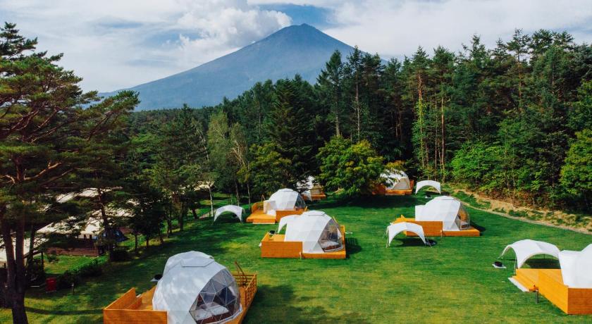 a tent is set up in a grassy area, PICA Fujiyama in Fujikawaguchiko