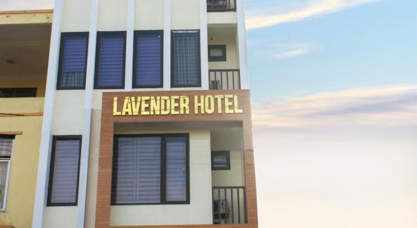 a large building with a large window on the side of it, Lavender Hotel in Dong Hoi (Quang Binh)