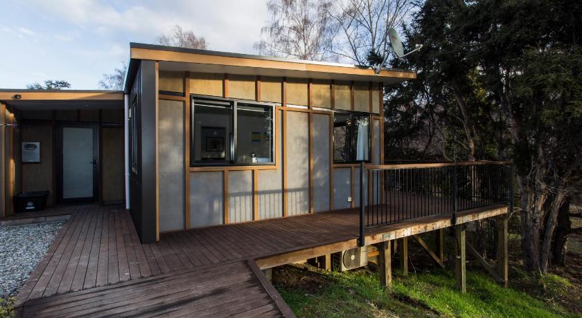 a house with a wooden roof and wooden floors, private hideaway in Wanaka