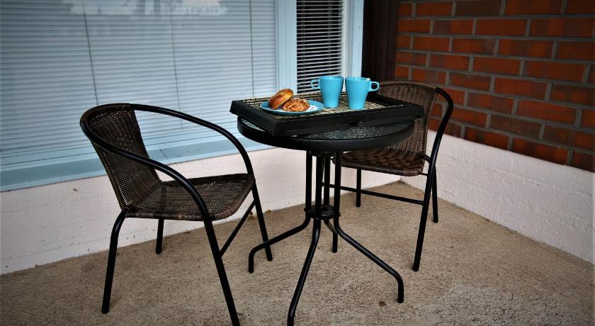 a table that has a bowl of food on it, Leikari "Nature" Bungalows with Terrace in Kotka