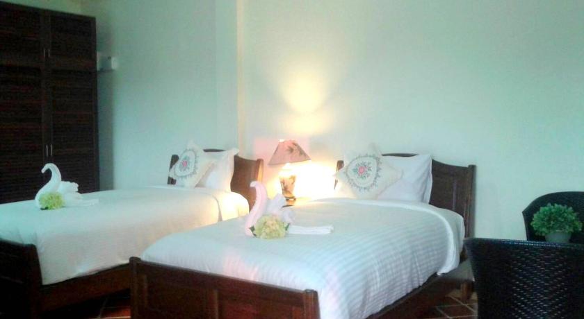 Bild av Deluxerum med King size-säng och utsikt mot pool (Deluxe Pool View King Bed) 15