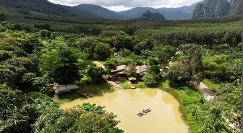 a scenic view of a river with a mountain range, Khaosok Homestay Resort in Surat Thani