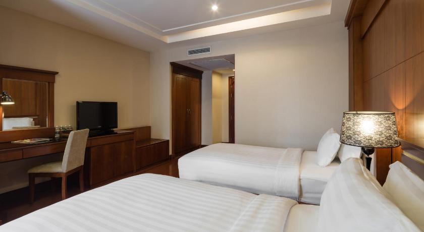 Zdjęcie: Pokój dwuosobowy typu Deluxe z 1 lub 2 łóżkami i widokiem na miasto (Deluxe Double or Twin Room with City View) 0