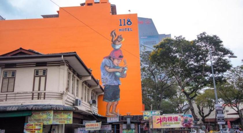 a building with graffiti on the side of it, 118 Hotel Macalister in Penang