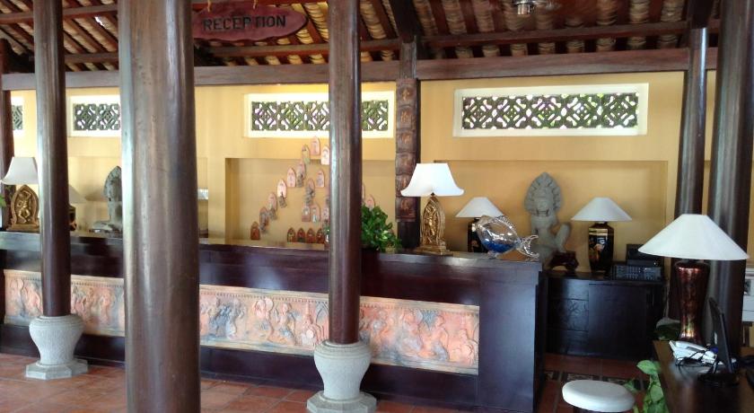 a hotel room with a lot of tables and chairs, Poshanu Resort in Phan Thiet