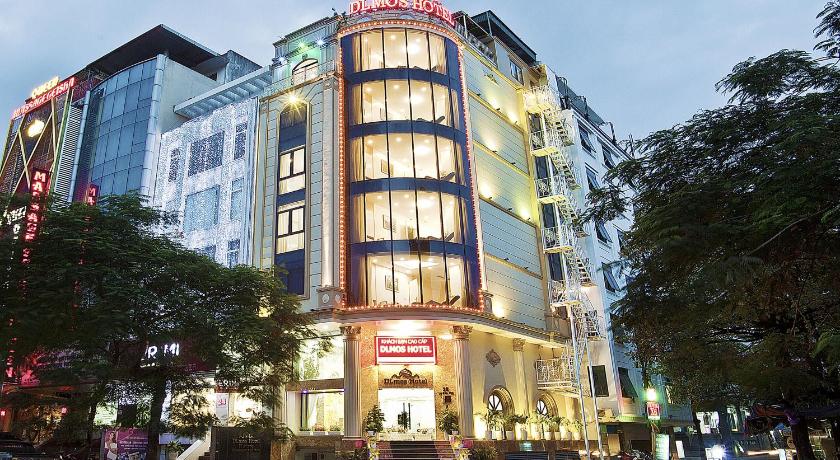 a large building with a clock on the side of it, DLmos Hanoi Hotel in Hanoi