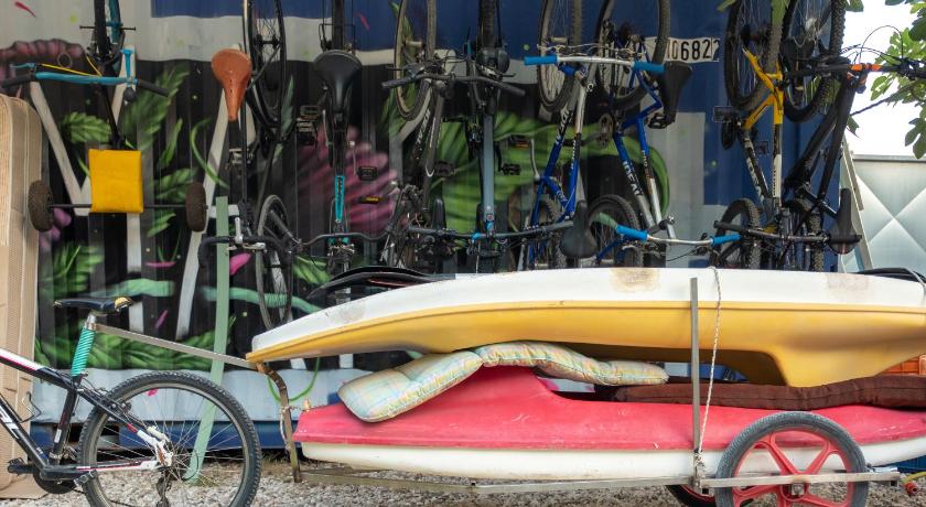 a bike with a surfboard attached to it, Himara Hostel in Vlora