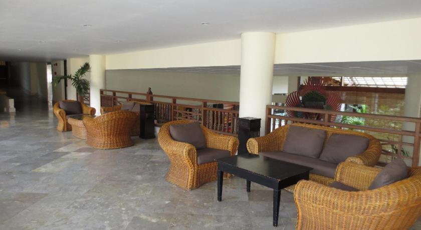 a living room filled with chairs and tables, Prime Plaza Hotel Sanur - Bali in Bali
