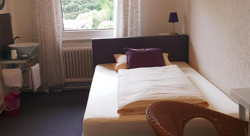 Image of Single Room with Shared Shower and Toilet 0