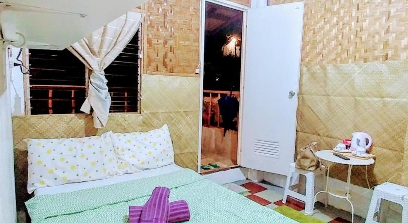 Image of Quadruple Room with Private Bathroom 11