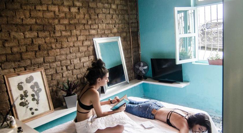 カリ Moonshine Boutique Hostal 3つ星 ホテル レストラン