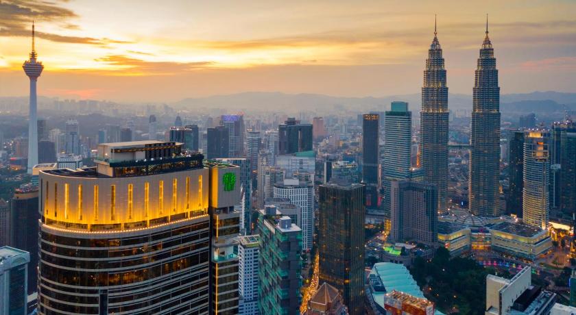 a city with tall buildings and skyscrapers, Banyan Tree Kuala Lumpur in Kuala Lumpur