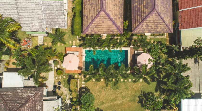 a garden filled with lots of plants and trees, Shu Villa Lombok in Lombok