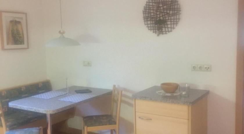 a kitchen with a table and a sink, Apartments Dilln Gutl in Tires