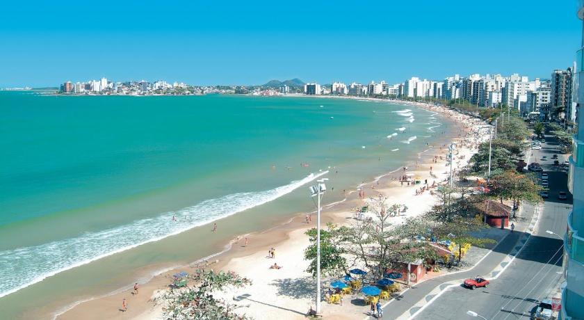 SEGUNDA CASA - Seu cantinho em Guarapari, 1 minuto a pe da Praia do Morro! Suites confortaveis e mod — Hotel in Guarapari