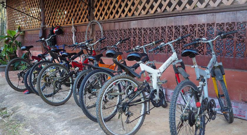 a row of bikes parked next to each other, Saen Kam Resort in Chiang Dao
