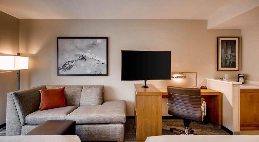 a living room filled with furniture and a tv, Hyatt Place Keystone in Keystone (CO)