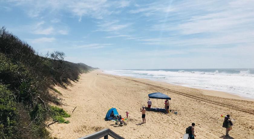 people on a beach near the ocean, Beachbreak Holiday Letting in Durban