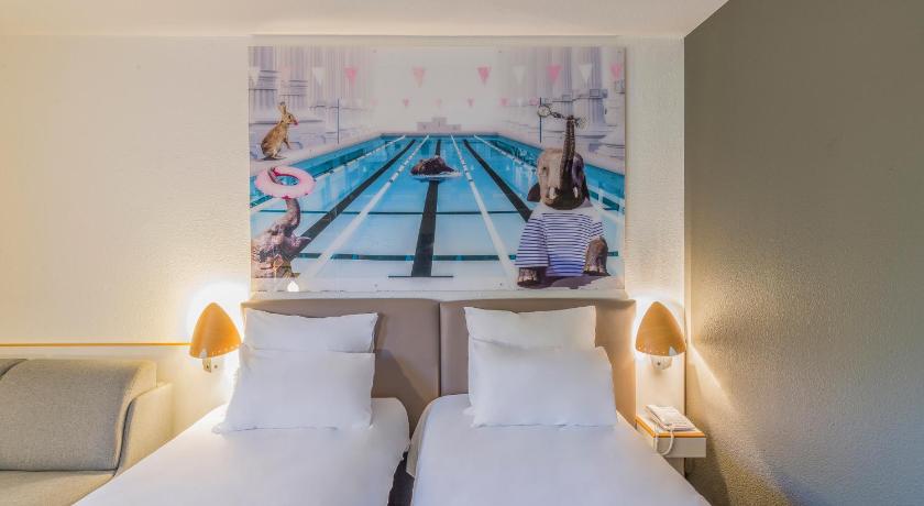 Image of Classic Room - 1 double bed and 1 two person so fa bed 11