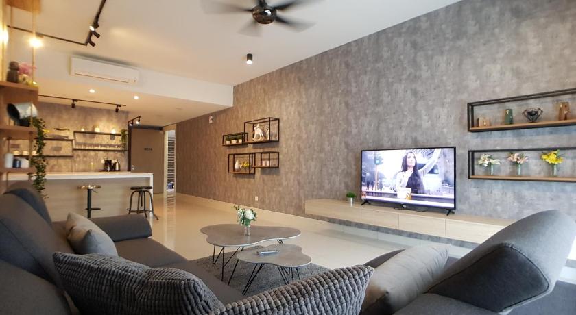 a living room filled with furniture and a tv, Southkey Mosaic by Asiapex in Johor Bahru