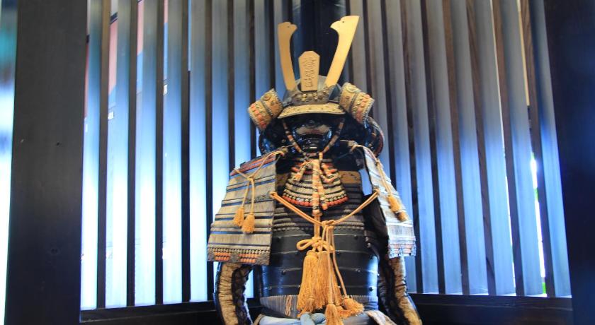 a statue of a man dressed in a costume, Maruyama Onsen Kojyokan in Tokamachi