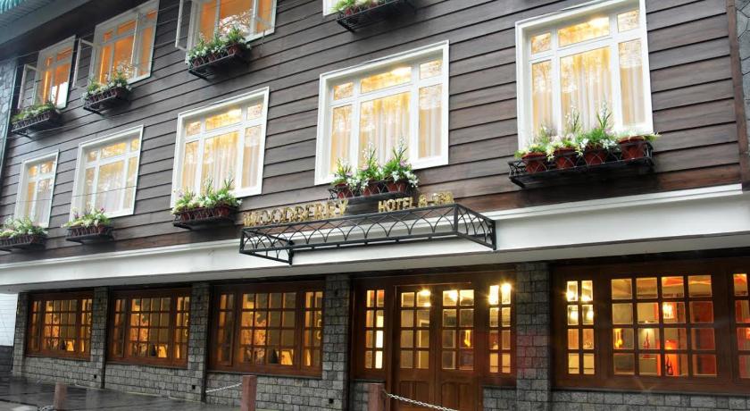 a row of windows in front of a building, Udaan Woodberry Hotel & Spa in Gangtok