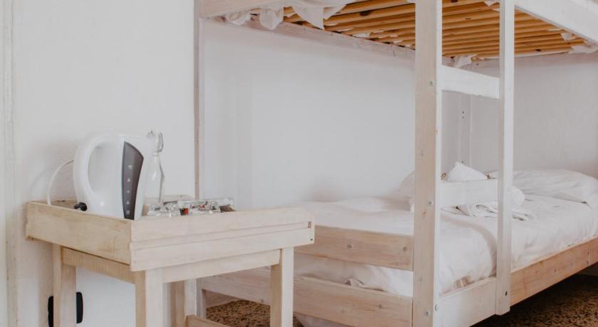 Image of Quadruple Room with Private Bathroom 4