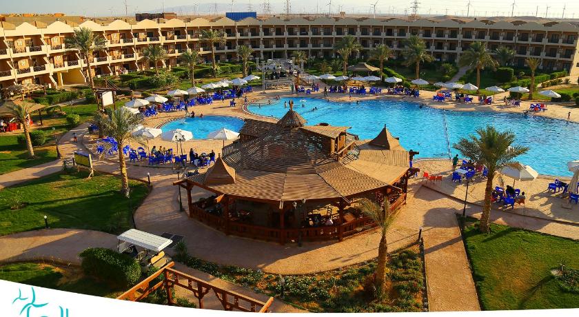 a large swimming pool in a large city, El Hayah Resort - Families Only in Ataqah