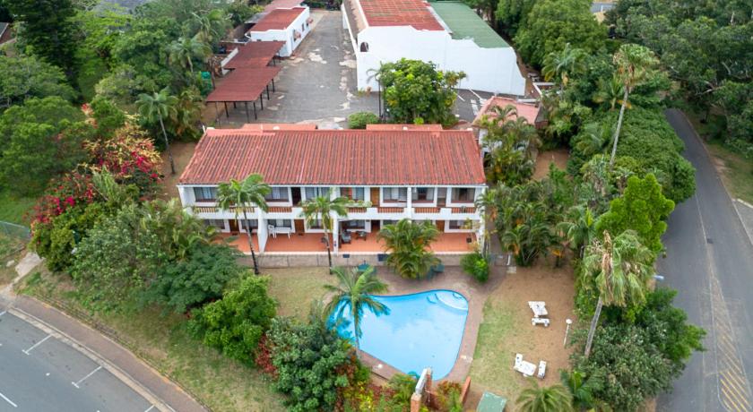 a house that has a lot of trees around it, Villa Mia Holiday Resort in Saint Lucia Estuary