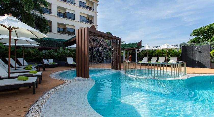a large swimming pool with a balcony overlooking the beach, Krabi Heritage Hotel (SHA Extra Plus) in Krabi